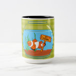 Happy clown fish sleeping in a fish bowl coffee mug