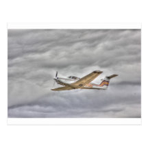 HDR Plane Flying in Cloud Skies Postcard