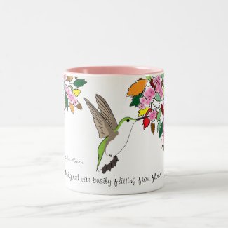 Heather Hummingbird flitting from flower to flower mug