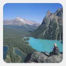 Hiker overlooking turquoise-colored Lake Square Stickers
