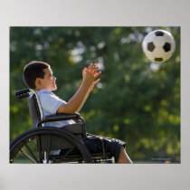 Hispanic boy, 8, in wheelchair with soccer ball print