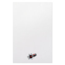 hockey puck ripping through stationery paper