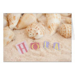 Hola, hello in Spanish on a sandy beach Greeting Cards