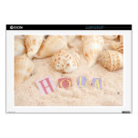 Hola, hello in Spanish on a sandy beach 17" Laptop Skin