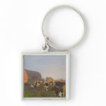 Holstein dairy cows outside a barn at sunrise key chain