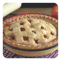 Home baked apple pie on cooling rack with apple square stickers