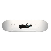 Hooded figure from side hand out skate board