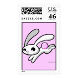 Hop the rabbit with fluffy pink tail postage stamp