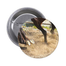 Horse hooves trampling the dirt. buttons