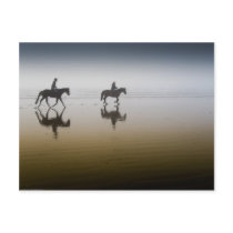 Horse riders at the beach postcard