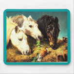 Horses eating hay mouse pad