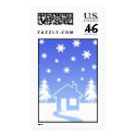 House and trees in snow postage