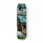 House With Green Striped Awning Custom Skate Board