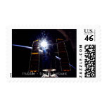 Hubble Telescope with Earth limb and sunburst. Stamps