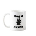 Huggable Skunk Hug A Skunk mugs