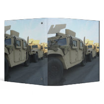 Humvees sit on the pier at Morehead City Binder