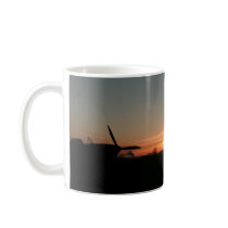 Hurricane sunset coffee mugs
