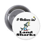 i believe in land sharks pinback buttons