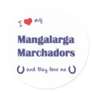 round_sticker - Show the world how much you love your Mangalarga Marchador horses (and that the feeling is mutual!). With a heart and two horseshoes, the words read 'I love my Mangalarga Marchadors and they love me'. This design is specifically for multiple horses (they), we also have variants available for a male horse (he) or female horse (she). A perfect gift for yourself or the Mangalarga Marchador lover in your life, this design is available on a variety of gift and apparel items!