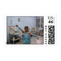 Illana in butterfly costume postage