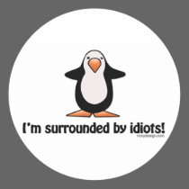 I'm surrounded by idiots! round sticker