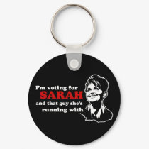 I'm voting for Sarah and that guy keychains by Palin_Shirts I'm voting for Sarah and that guy keychains