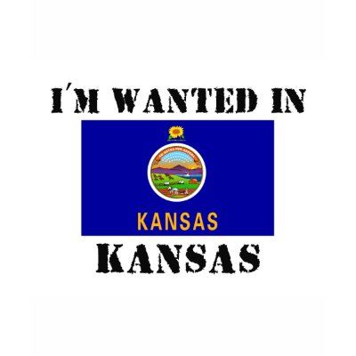 I'm Wanted In Kansas T-shirt by flagshirt