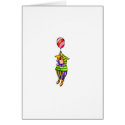 Clown flying from balloon