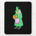 Green witch with pumpkin