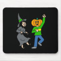 Witch dancing with pumpkin head