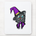 Black cat in purple hat