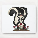 silly cute skunk and red roses