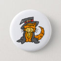 Orange cat in witches outfit