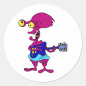 Funny alien playing guitar