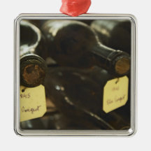 In the underground wine cellar: lying bottles in christmas tree ornaments