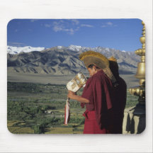 India, Ladakh, Thikse. Buddhist monk blows Mouse Pads