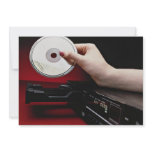 Inserting CD into CD player Invites