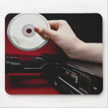 Inserting CD into CD player Mouse Pad