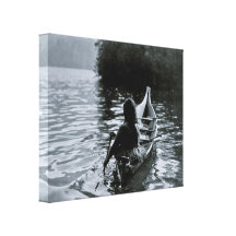 Into the shadows, Clayoquot Indian in boat Stretched Canvas Prints
