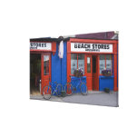 Ireland, Strandhill. Storefronts with bicycles Canvas Print