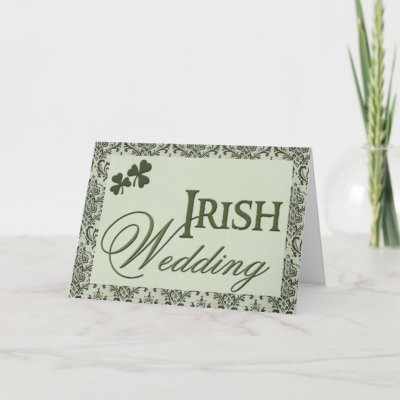 Irish Wedding in Irish and script font with kelly green shamrocks and dark