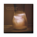 "It is better to light one candle" magnet