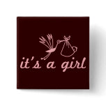 It's a girl pink and brown button