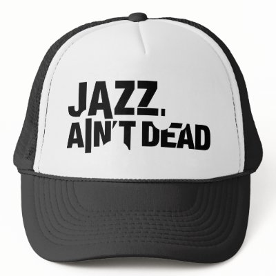 JAZZ AIN'T DEAD Basic Trucker Hat by JazzAintDead