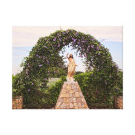 Jesus Statue with Beautiful Flowers Stretched Canvas Prints
