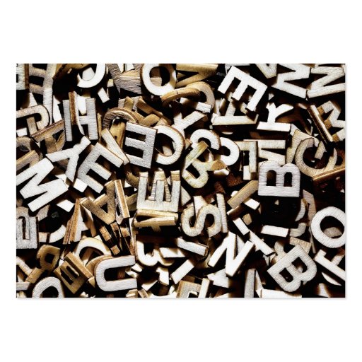 Jumbled letters made of wood close up business card (back side)