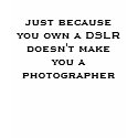 just because you own a DSLR doesn't make you a ... t-shirts by lubvianka just because you own a DSLR doesn't make you a ... t-shirts