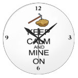 Keep Calm And Mine On wall clocks