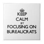 Keep Calm by focusing on Bureaucrats Ceramic Tile