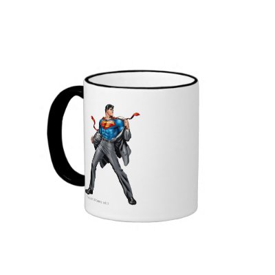 Kent changes into Superman mugs